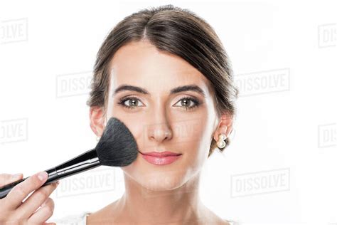 Partial View Of Makeup Artist Applying Powder On Models Face Using Makeup Brush Isolated On