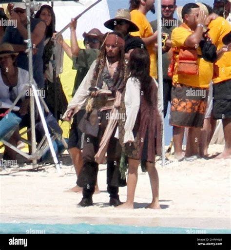 exclusive johnny depp and penelope cruz film a kissing scene on a deserted island for the