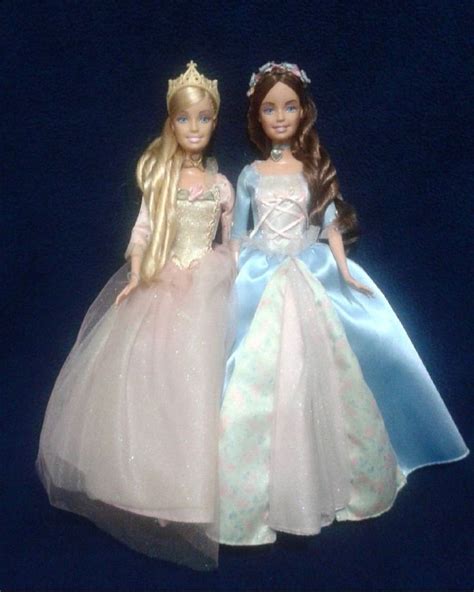 Two Barbie Dolls Are Standing Next To Each Other On A Blue Background