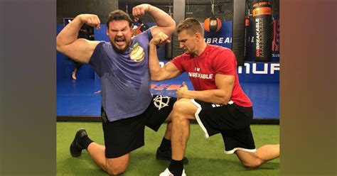 Watch The Worlds Strongest Man Lift Rob Gronkowski Over His Head