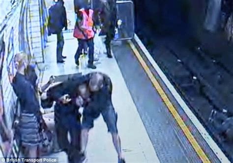 The Moment Crazed Commuter Shoves 23 Year Old Woman On To Tube Tracks Daily Mail Online