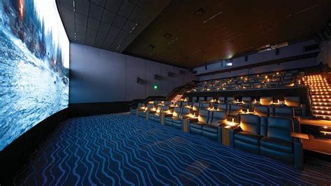 Let the dunes be your ultimate destination for relaxation & adventures. The Lot City Center Movie Theater | Precision Estimating ...