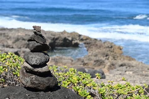 Heap Of Stacked Rocks Beach And Ocean Surf Kaena Point In Oahu