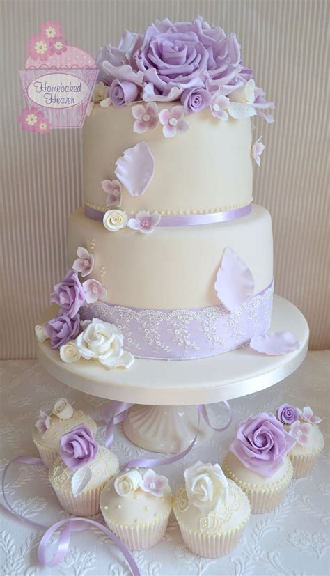 Ivory Wedding Cake With Giant Lilac Roses And Matching