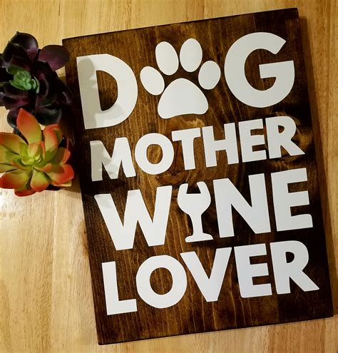 Add all of her kids' (or grandkids') names to a cookie jar or their photos on a personalized blanket or pillow. Dog Sign, Dog Mom, Mother's Day Gift Ideas, Wine Lover ...