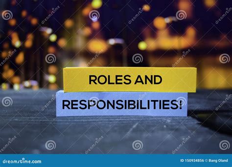 Roles And Responsibilities With Wooden Pen Royalty Free Stock Image