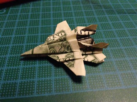 Folded Origami Origami Fighter Plane Using Dollar Bills
