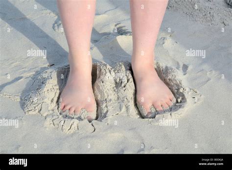 Sand Between Her Toes On Hunting Island South Carolina Usa Stock Photo