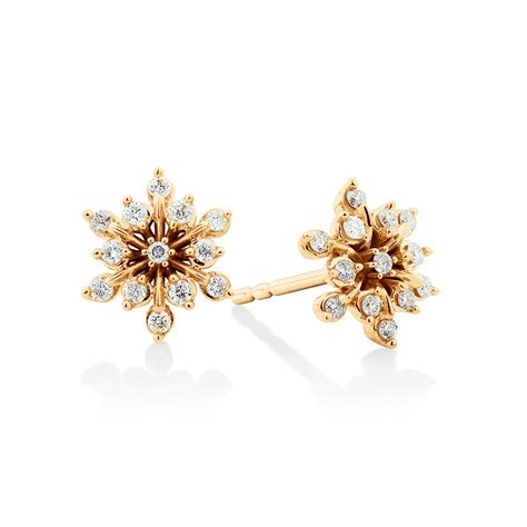 Flower Stud Earrings With 0 20 Carat TW Of Diamonds In 10ct Yellow Gold