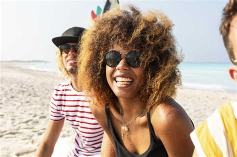 Group Of Friends Having Fun On The Beach Stock Photo