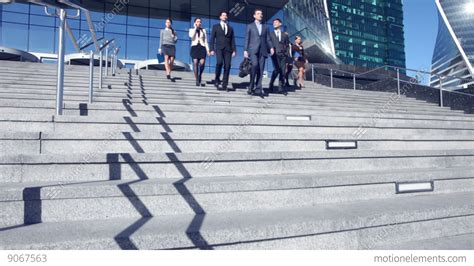 Business People Walking Down Stairs Stock Video Footage 9067563
