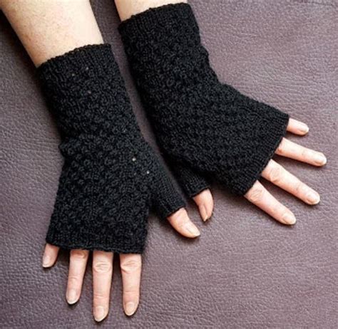 Quick and easy fingerless gloves pattern. Black Lace Fingerless Gloves Knitting Pattern | AllFreeKnitting.com