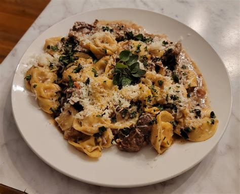 Braised beef and tortellini in marsala sauce