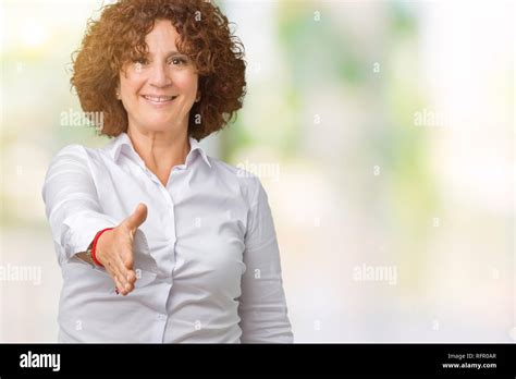 Beautiful Middle Ager Senior Businees Woman Over Isolated Background