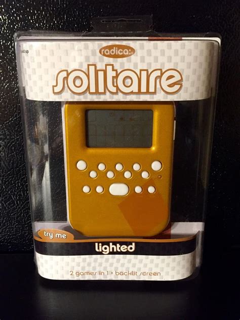 Radica Lighted Classic Solitaire Handheld Electronic Game Backlit