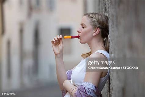 sucking popsicle photos and premium high res pictures getty images