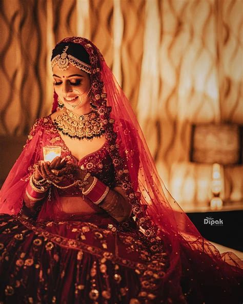 Beautiful Bride In A Classic Red Lehenga Bridalphotographyposes Bride Photography Poses
