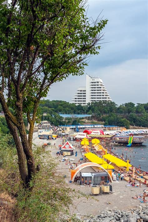 Malaya Bay In Anapa Resort People Rest On Stony Beach Of Black Sea On