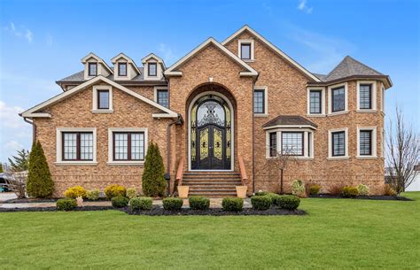 West Islip Waterfront Wonders: A Tale of Two Homes - Jones Hollow