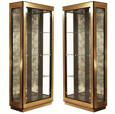 Two Modern Black Lacquered Brass Curio Display Cabinets By Mastercraft