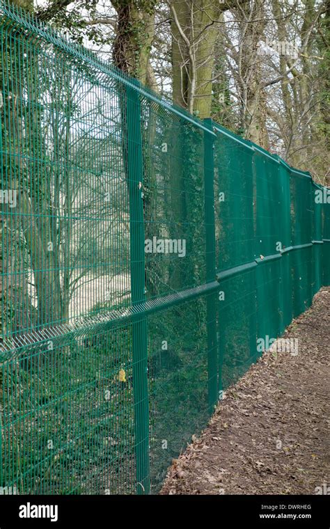 Green Wire Mesh Fencing Uk Stock Photo Alamy