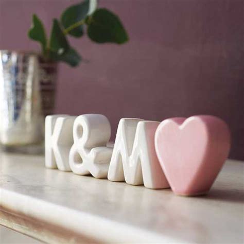 Once the letters are fully dry, you can take your sandpaper and sand the edge gently for a finished look. Personalizing Interior Decorating with DIY Wooden Letters ...