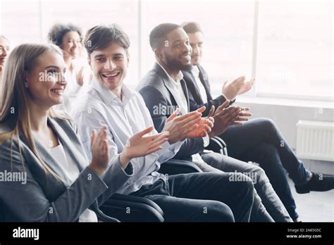Happy Business People Clapping Hands During Meeting Conference Stock