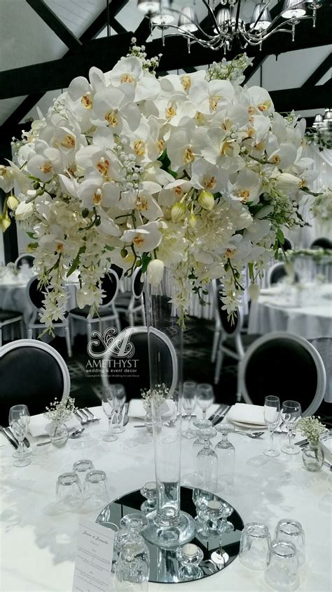 Tall White Orchid Centerpiece More Info