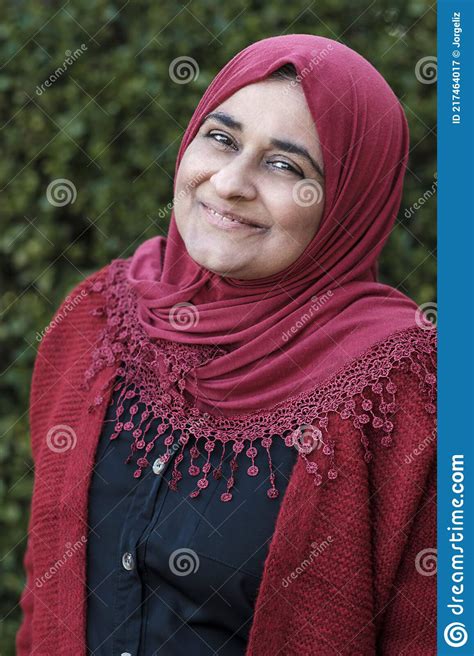 mature muslim woman wearing hijab is posing stock image image of peaceful lifestyle 217464017