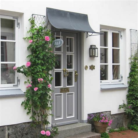 A metal door canopy is usually made out of galvanised steel or iron and offers a stylish canopy for your front door that is timeless and oozes quality. Door canopy season - Garden Requisites