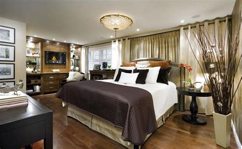 Stunning master bedroom with glass chandelier hung from tray ceilings painted in a metallic glaze. HGTV Candice Olson Bedrooms | elements, comfortable ...