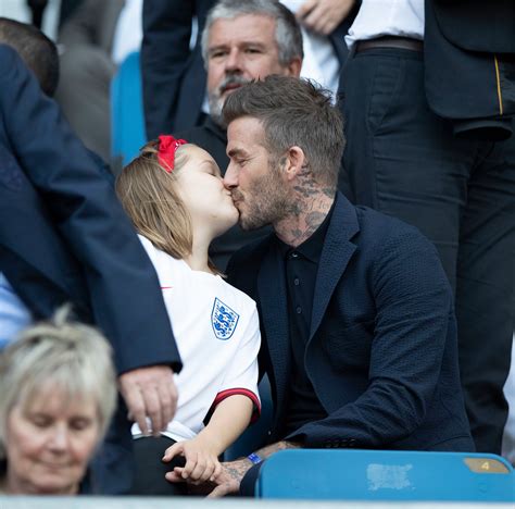 David Beckham Kisses Daughter Harper On The Lips At Football Match