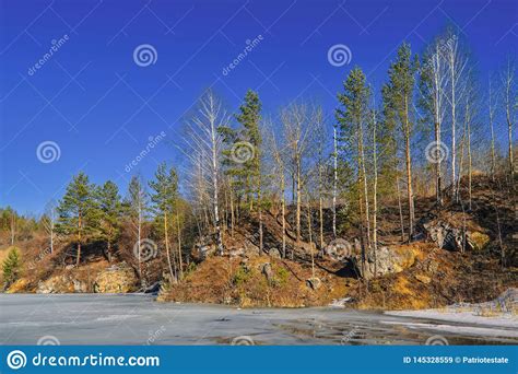 Early Spring Ice Melts On A Forest Lake Stock Image Image Of Cloud