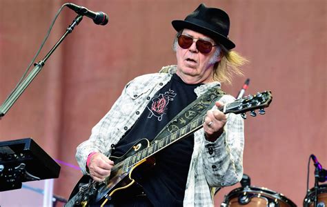 Neil Young says his application for US citizenship has been delayed because of his marijuana use