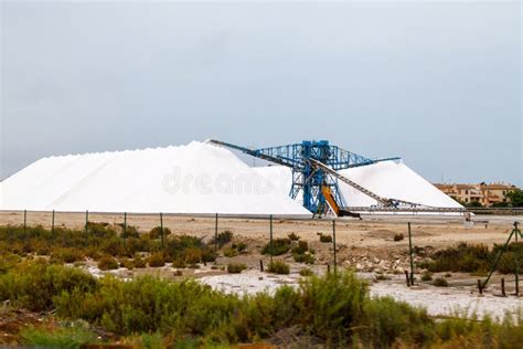 Extraction Of Sea Salt Mountains Stock Photo Image Of Machinery