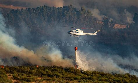 Helicopter With Bambi Bucket Over The Fire Stock Image Image Of