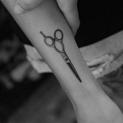 Scissors Tattoo On The Right Inner Forearm