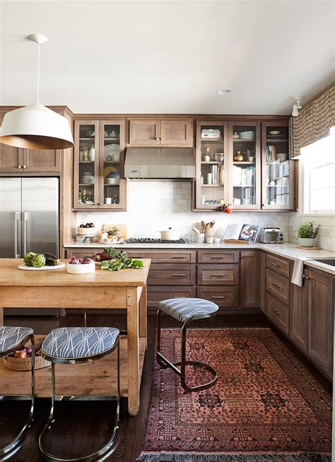Rustic kitchen cabinets are not heavily ornamented but puts emphasis on layering of textures and a good way to achieve such is by carving kitchen cabinet doors with small decorative details. How to Choose Cabinet Materials | Better Homes & Gardens