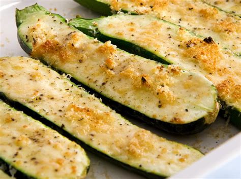 Line a baking tray with parchment paper or a silicone baking sheet. Baked Zucchini with Parmesan | Cookstr.com