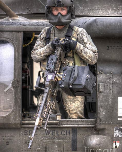 A Uh 60 Black Hawk Door Gunner Manning Poster By Terry Moore