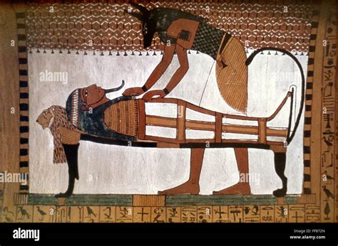 egypt embalming negyptian fresco of anubis embalming a mummy from the tomb of sennutem at