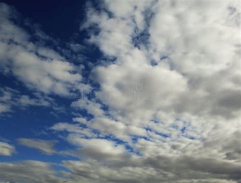Overcast Smooth Clouds Texture On Blue Day Sky Background Stock Photo