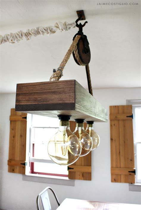 Upcycled light fixtures = cool character. DIY Hanging Light Fixture - Jaime Costiglio