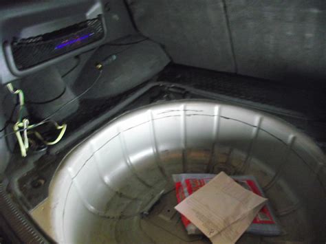 The pickup tube comes installed on the top of the tank. jeep wj tank lift - JeepForum.com