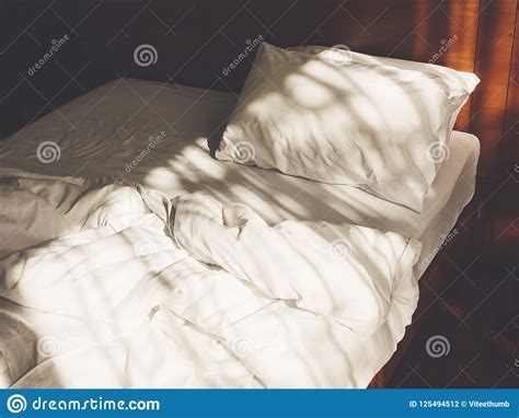 Bed Mattress Pillow Unmade Bedroom Morning With Sunlight Stock Photo