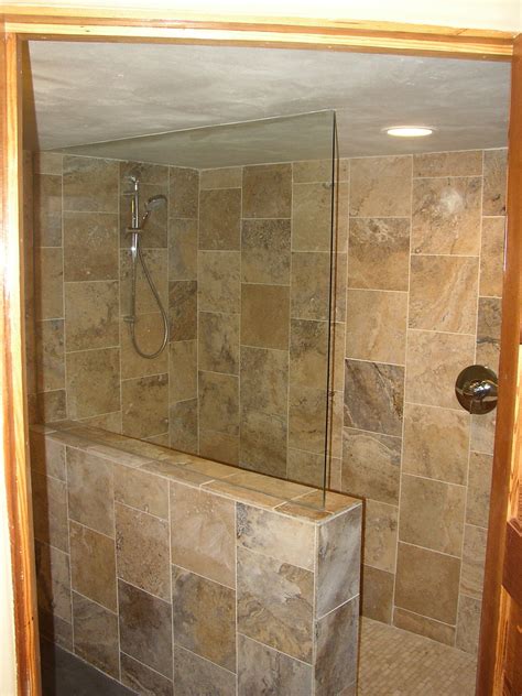 You may have heard this one before, well, whoever told you is right. Basement remodel with travertine tile walk-in shower. | Flickr