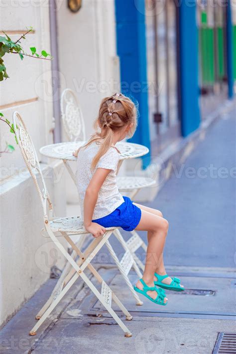 Little Girl Sitting Down 20092778 Stock Photo At Vecteezy