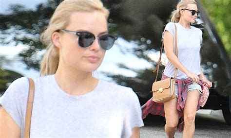 Margot Robbie Shows Off Her Toned Pins In Tiny Denim Cut Offs As She Steps Out In Hollywood