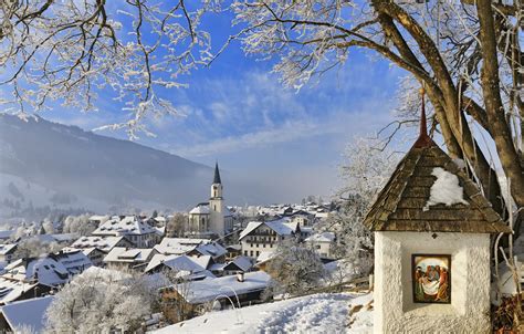 Обои зима пейзаж горы дома Германия крыши Бавария деревня церковь картинки на рабочий