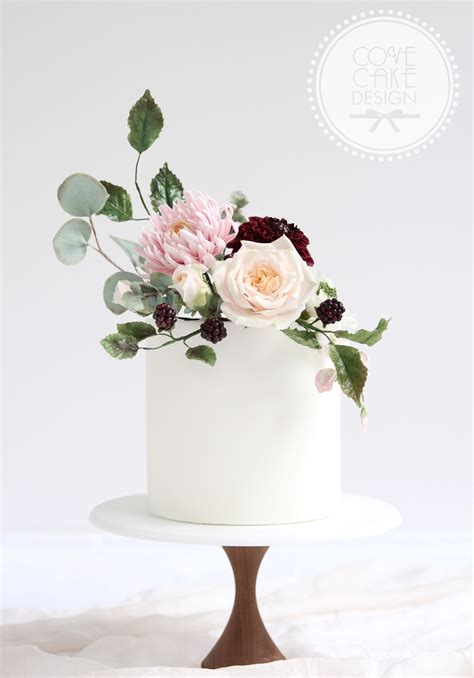 pretty single tier wedding cake with sugar flower bouquet including sugar chrysanthemum pompom